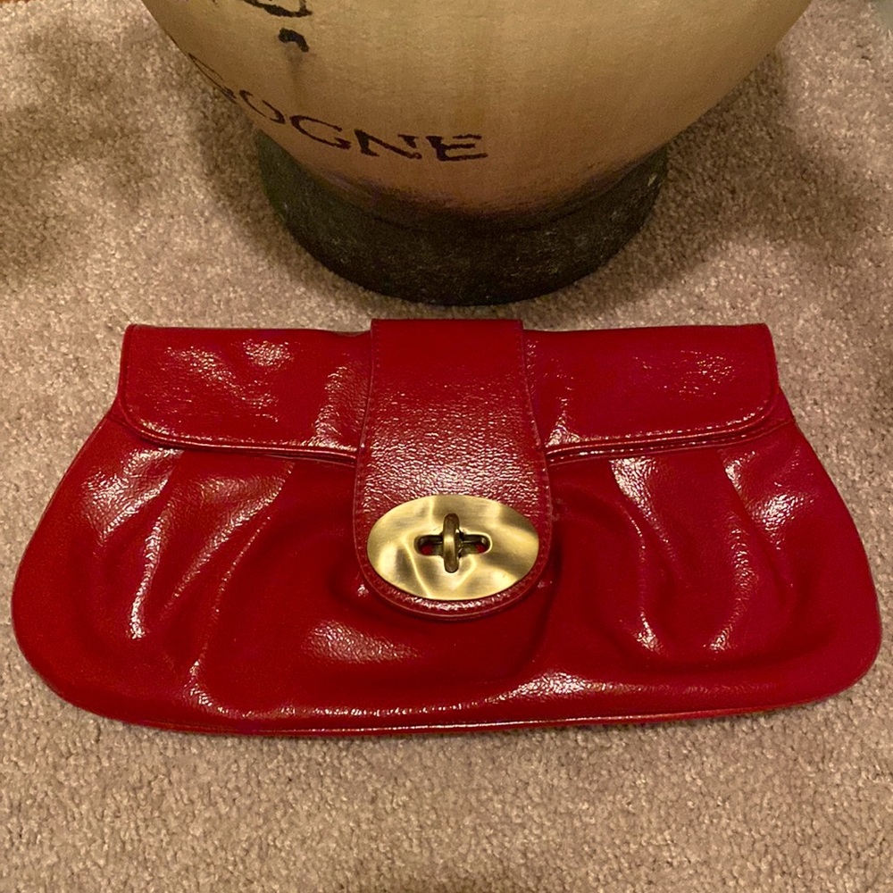 Express Red Clutch with Gold Buckle Closure
